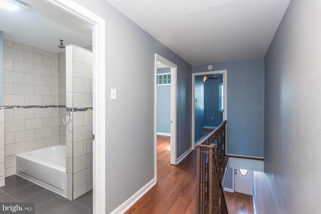 3539 Almond St, Philadelphia, PA 19134 - hallway with an upstairs landing, dark wood-style floors, and baseboards