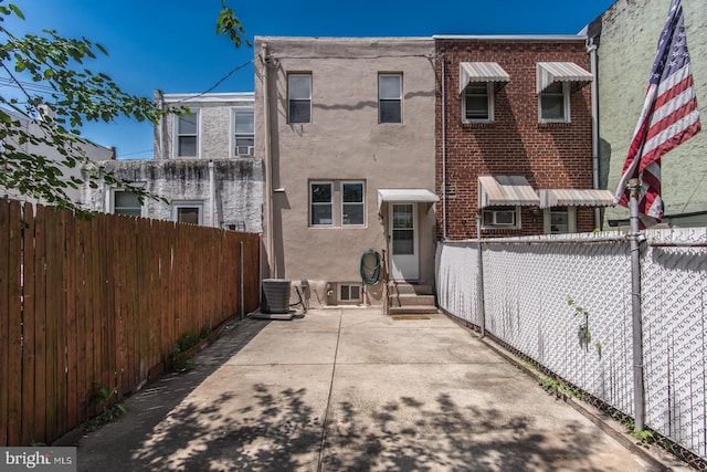 3539 Almond St, Philadelphia, PA 19134 - back of house with stucco siding and brick siding