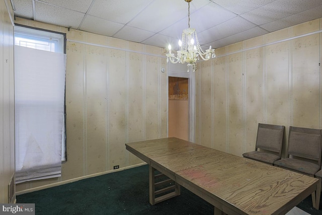 1721 Ruxton Ave, Baltimore, MD 21216 - unfurnished dining area with a chandelier, a paneled ceiling, and carpet flooring