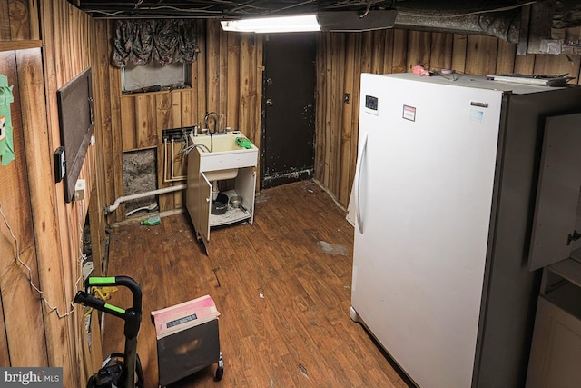 1721 Ruxton Ave, Baltimore, MD 21216 - finished basement featuring freestanding refrigerator, wood finished floors, and wood walls