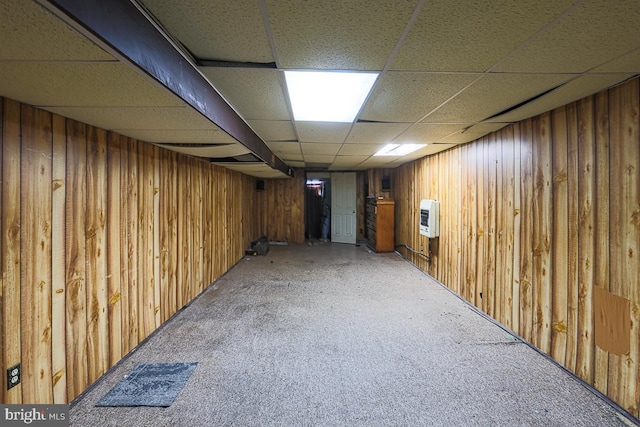 1721 Ruxton Ave, Baltimore, MD 21216 - finished basement with heating unit, carpet floors, wooden walls, and a paneled ceiling