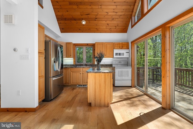 2107 Lenape Ter, Canadensis, PA 18325 - kitchen with white appliances, a kitchen island, high vaulted ceiling, light wood finished floors, and a sink