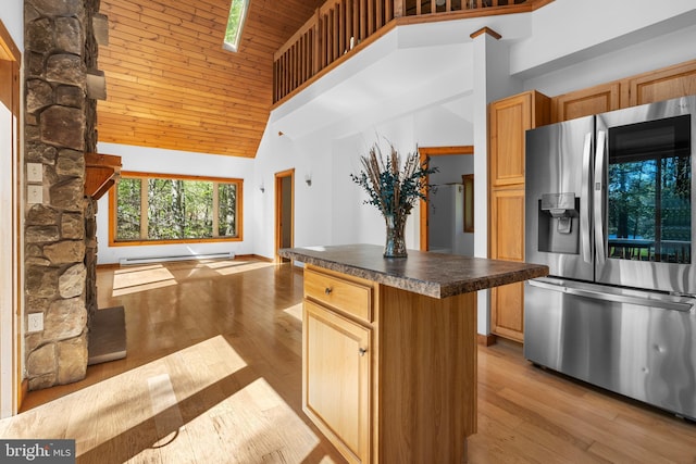 2107 Lenape Ter, Canadensis, PA 18325 - kitchen featuring stainless steel fridge with ice dispenser, high vaulted ceiling, dark countertops, wooden ceiling, and wood-type flooring
