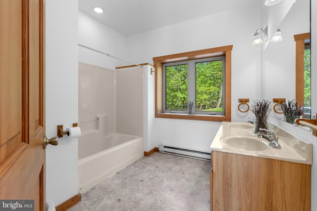 2107 Lenape Ter, Canadensis, PA 18325 - bathroom with a baseboard radiator, double vanity,  shower combination, and baseboards