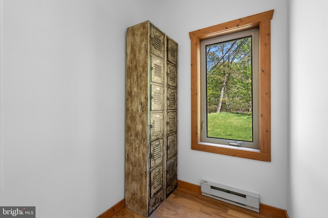 2107 Lenape Ter, Canadensis, PA 18325 - entryway with a baseboard heating unit, baseboards, and light wood-style flooring
