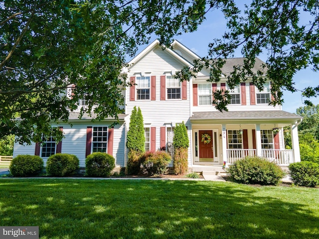 294 Arthur Ave, Port Deposit, MD 21904 - view of front facade featuring a front lawn and a porch