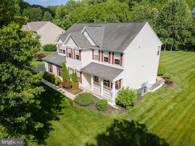 294 Arthur Ave, Port Deposit, MD 21904 - view of front facade featuring a shingled roof, a porch, and a front lawn