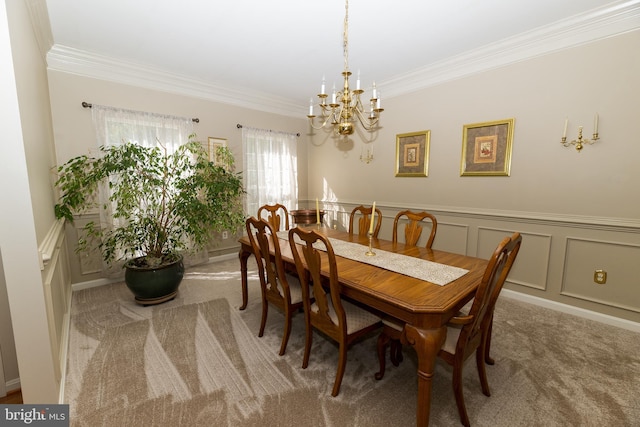 294 Arthur Ave, Port Deposit, MD 21904 - dining area with a chandelier, crown molding, carpet floors, wainscoting, and a decorative wall