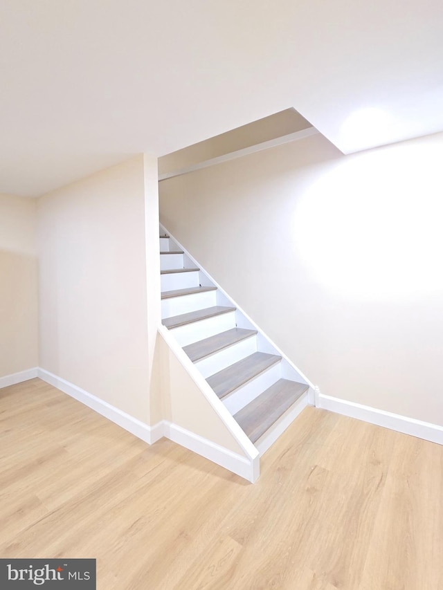 585 Andrew Dr, Southampton, PA 18966 - staircase with wood finished floors and baseboards