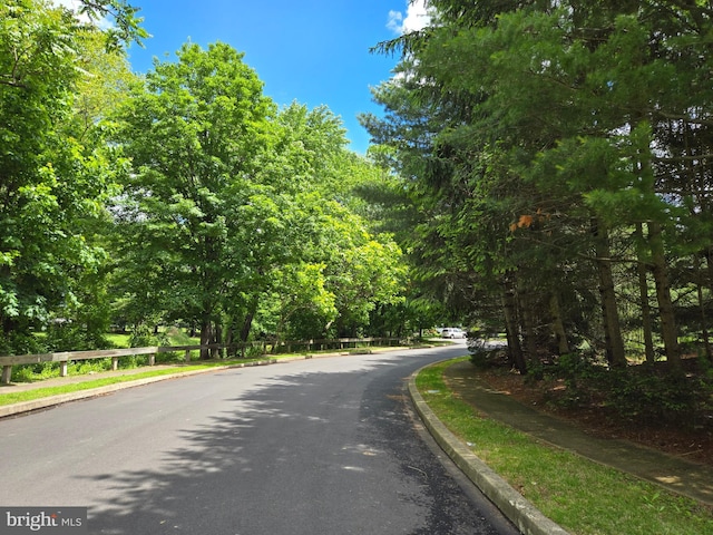 585 Andrew Dr, Southampton, PA 18966 - view of asphalt road featuring curbs and sidewalks