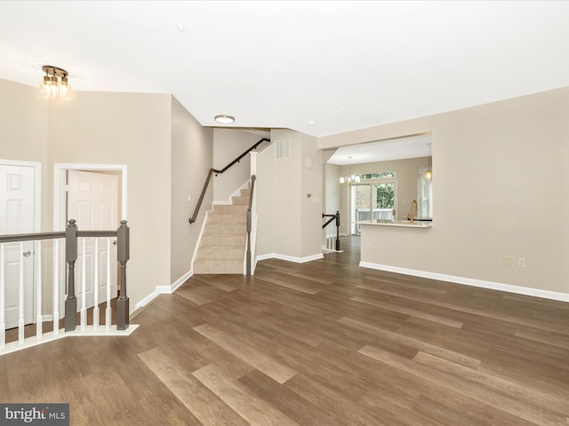 5534 Upshur, Frederick, MD 21703 - unfurnished room featuring wood finished floors, a chandelier, and baseboards