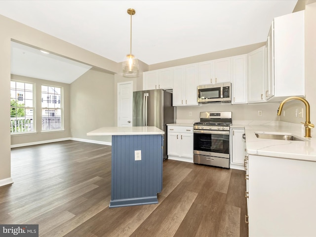 5534 Upshur, Frederick, MD 21703 - kitchen featuring stainless steel appliances, a sink, dark wood-type flooring, a center island, and vaulted ceiling