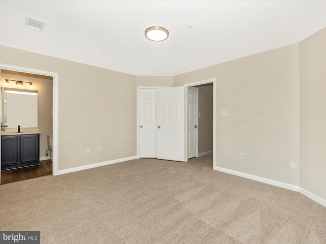 5534 Upshur, Frederick, MD 21703 - unfurnished bedroom featuring carpet flooring, baseboards, and connected bathroom