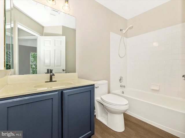 5534 Upshur, Frederick, MD 21703 - full bath featuring wood finished floors, toilet, vanity, and shower / bathtub combination