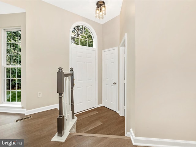 5534 Upshur, Frederick, MD 21703 - entryway with wood finished floors, healthy amount of natural light, and baseboards
