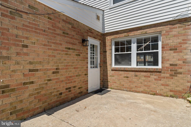 6305 Powder Horn Ct, Bensalem, PA 19020 - doorway to property with a patio area and brick siding