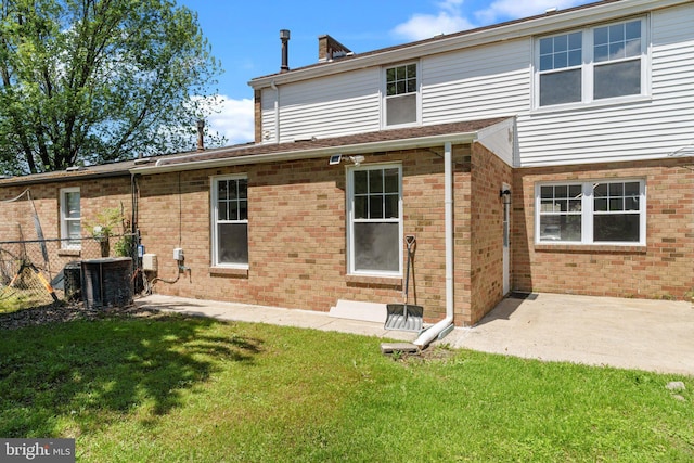 6305 Powder Horn Ct, Bensalem, PA 19020 - back of property with central air condition unit and brick siding