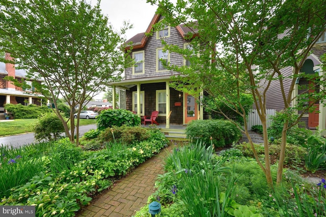 213 N Queen St, Chestertown, MD 21620 - victorian house with a porch