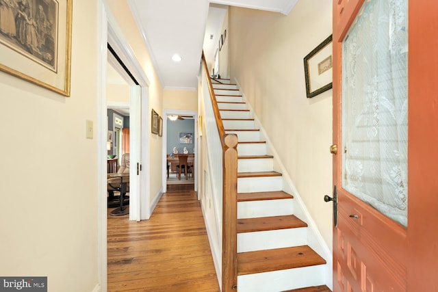 213 N Queen St, Chestertown, MD 21620 - entryway featuring wood finished floors, stairway, recessed lighting, crown molding, and baseboards