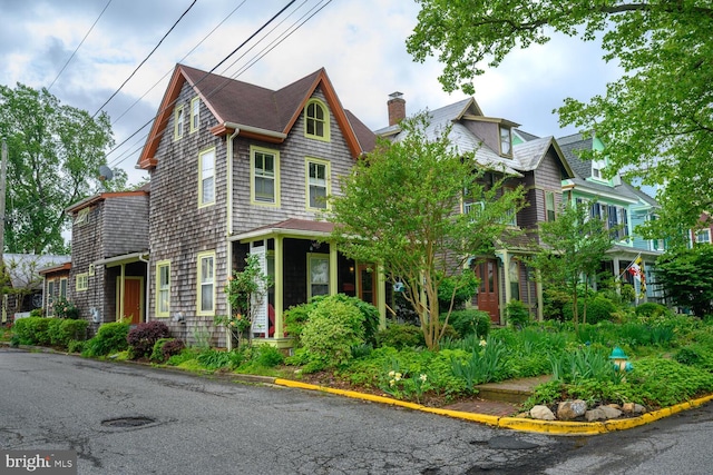 213 N Queen St, Chestertown, MD 21620 - view of front of home featuring a chimney
