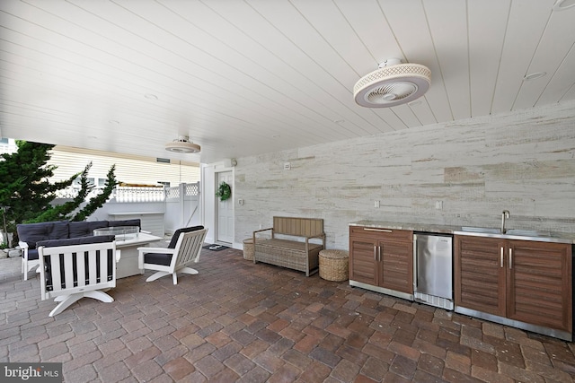38 N 10th St, Surf City, NJ 08008 - view of patio / terrace with an outdoor living space, exterior kitchen, and a sink