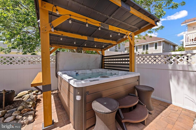 38 N 10th St, Surf City, NJ 08008 - fenced backyard featuring a hot tub and a gazebo
