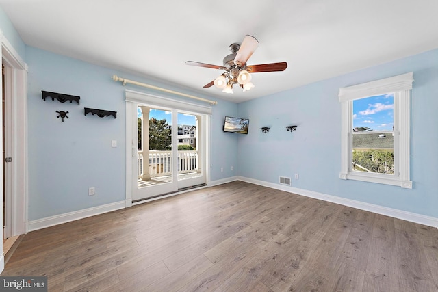 38 N 10th St, Surf City, NJ 08008 - unfurnished room with wood finished floors, ceiling fan, and baseboards