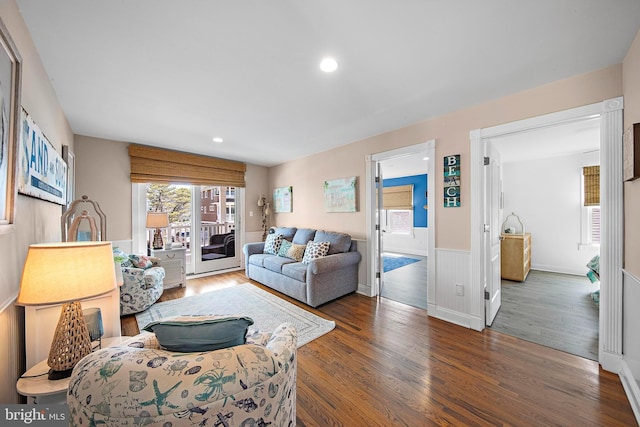 38 N 10th St, Surf City, NJ 08008 - living room featuring wood finished floors, wainscoting, and recessed lighting