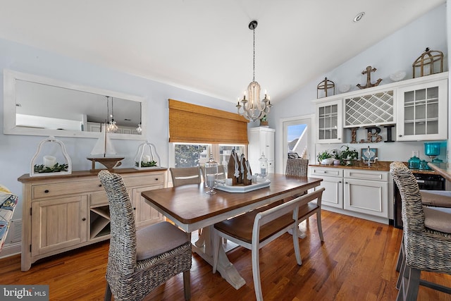 38 N 10th St, Surf City, NJ 08008 - dining room featuring a chandelier, vaulted ceiling, and light wood-style flooring
