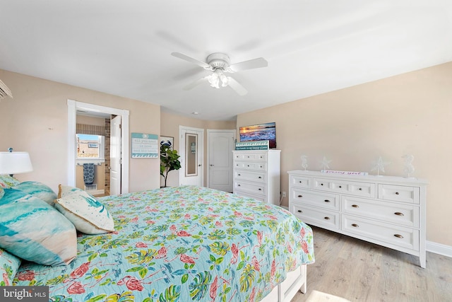 38 N 10th St, Surf City, NJ 08008 - bedroom with light wood-style flooring, a ceiling fan, connected bathroom, and baseboards
