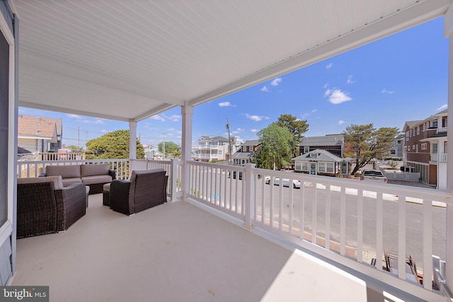 38 N 10th St, Surf City, NJ 08008 - view of patio with outdoor lounge area, a residential view, and a balcony