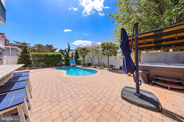 38 N 10th St, Surf City, NJ 08008 - view of swimming pool featuring a patio area, a hot tub, and a fenced backyard
