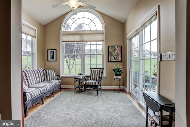 137 Settlers Way, Boalsburg, PA 16827 - living area featuring healthy amount of natural light, lofted ceiling, ceiling fan, and wood finished floors