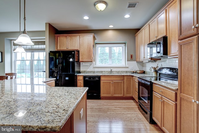 137 Settlers Way, Boalsburg, PA 16827 - kitchen with black appliances, light wood-style flooring, backsplash, light stone counters, and recessed lighting