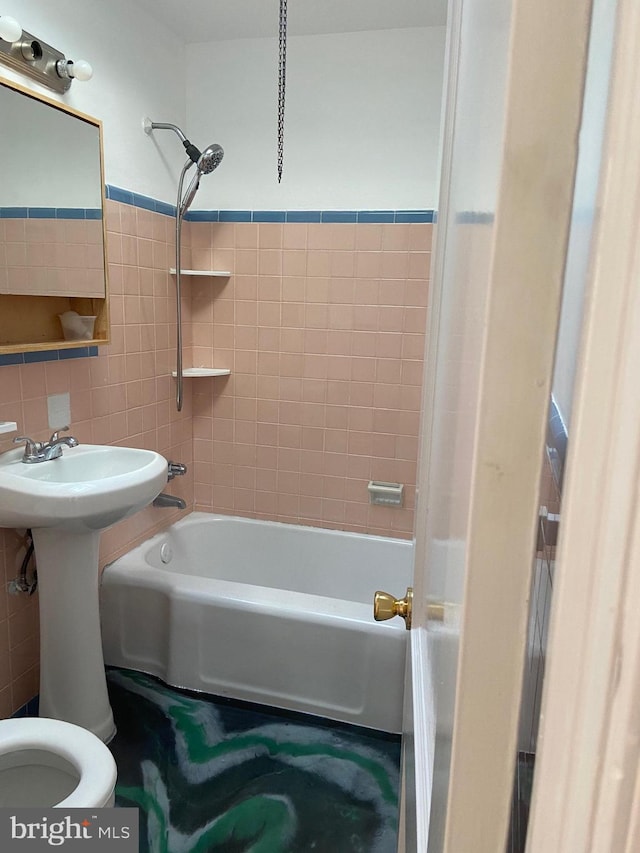 4014 Lansing St, Philadelphia, PA 19136 - bathroom featuring tile walls, shower / bath combination, toilet, and tasteful backsplash