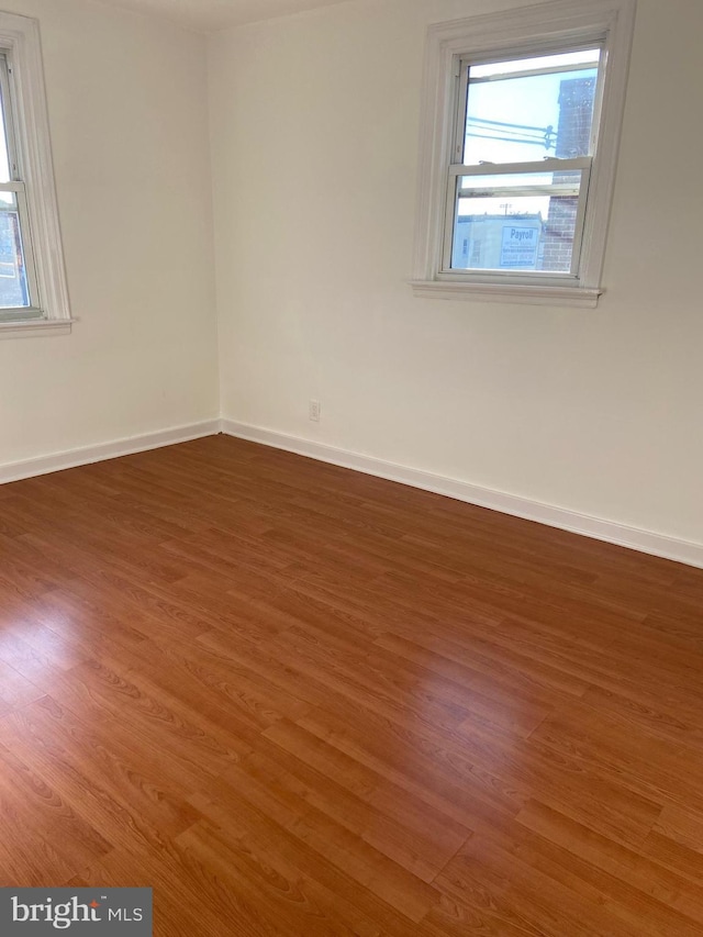 4014 Lansing St, Philadelphia, PA 19136 - empty room with wood finished floors and baseboards