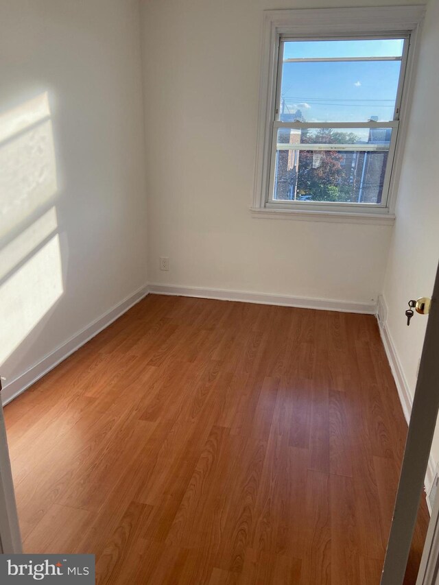 4014 Lansing St, Philadelphia, PA 19136 - spare room featuring wood finished floors and baseboards