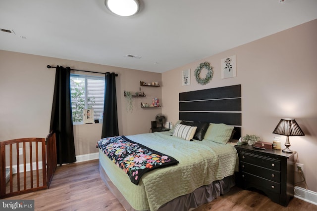 26248 Tranquility View Ct, Mechanicsville, MD 20659 - bedroom featuring wood finished floors and baseboards