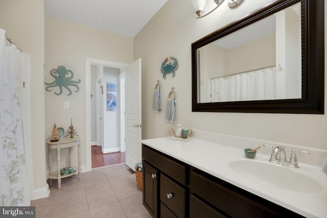 26248 Tranquility View Ct, Mechanicsville, MD 20659 - full bath featuring tile patterned flooring, double vanity, and baseboards
