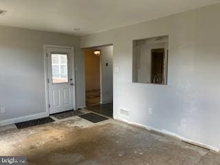 6317 Congress Ct, Bensalem, PA 19020 - foyer entrance featuring baseboards and concrete flooring