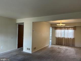 6317 Congress Ct, Bensalem, PA 19020 - carpeted empty room with a chandelier and baseboards