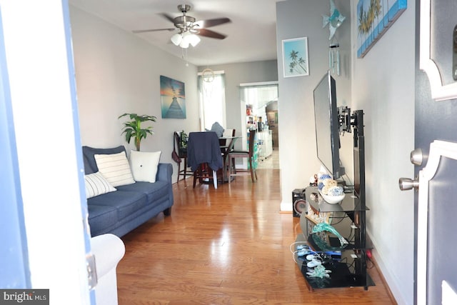 952 Moss St, Reading, PA 19604 - living room featuring wood finished floors, ceiling fan, and baseboards