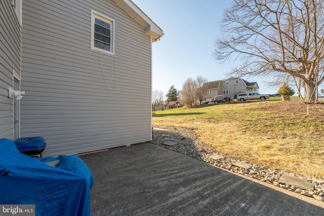 deck featuring a patio and a lawn