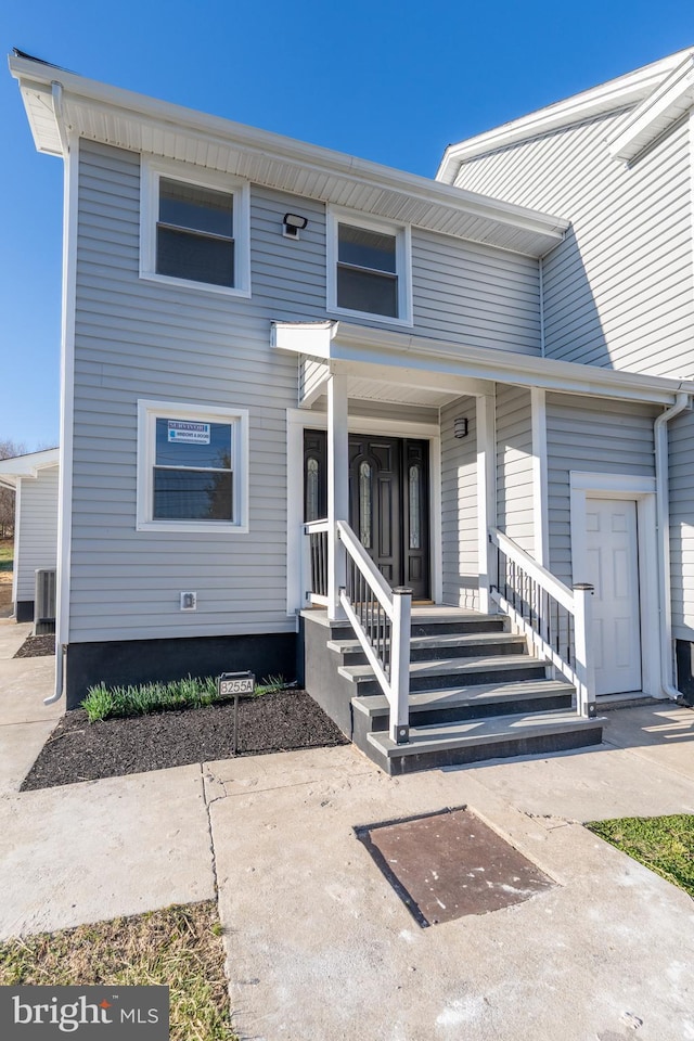 view of front of property featuring central AC unit