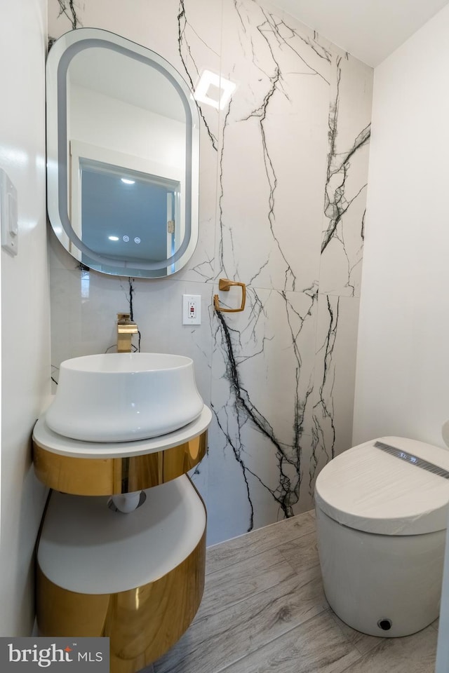 half bath featuring vanity