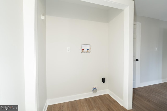 laundry room featuring washer hookup, dark wood-style floors, baseboards, and electric dryer hookup