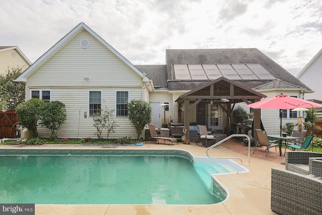 128 Trunk Dr, Stephens City, VA 22655 - back of house with a gazebo, a patio, a shingled roof, and an outdoor living space