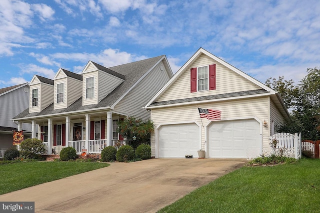 128 Trunk Dr, Stephens City, VA 22655 - view of front of home with a porch, concrete driveway, a garage, and roof with shingles
