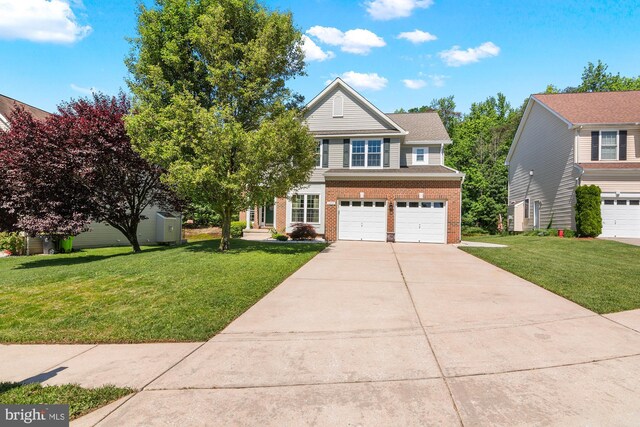 1209 Stevenage Ct, Abingdon, MD 21009 - view of front of property with brick siding, driveway, a front yard, and a garage