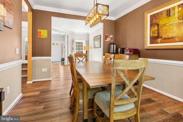 1209 Stevenage Ct, Abingdon, MD 21009 - dining room with wood finished floors, ornamental molding, decorative columns, and baseboards